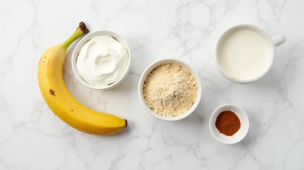 Flat lay of ingredients for a banana bariatric shake recipe
